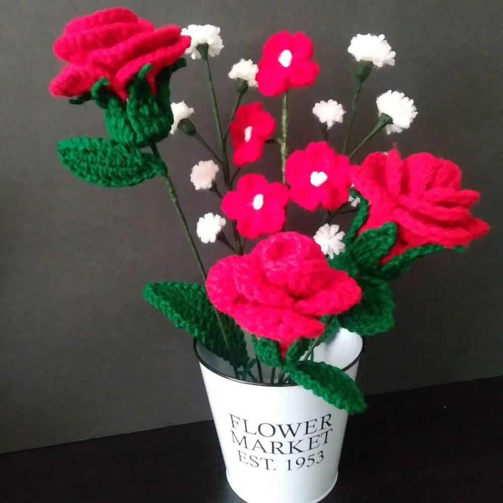 Handmade crochet bouquet of red roses,